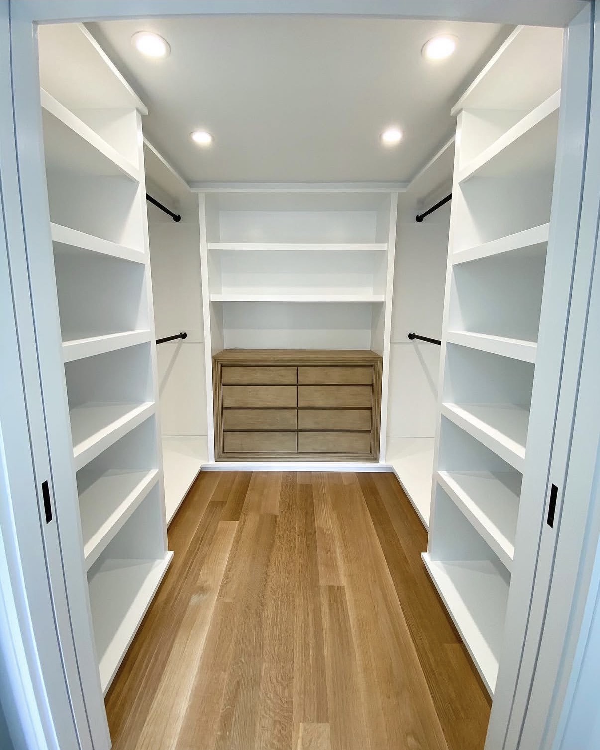 Walk-in closet with custom built-in shelving