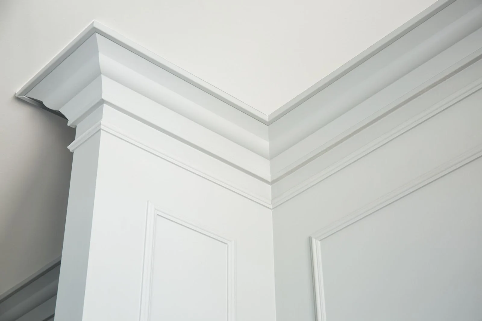 Precision crown molding detail at cabinet junction