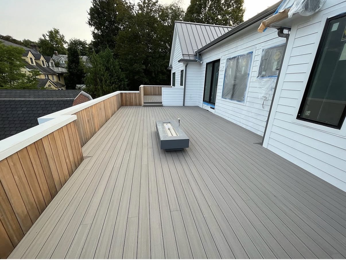 Rooftop deck with composite decking and fire feature